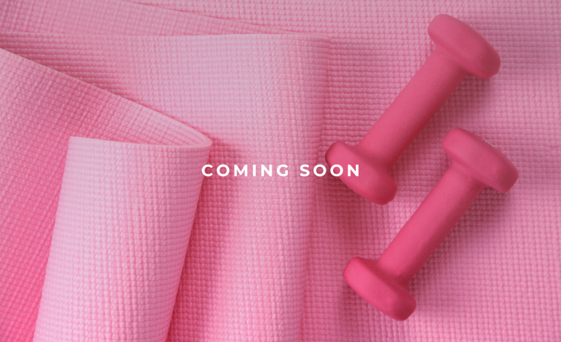 stock image of pink workout mat and dumbbell