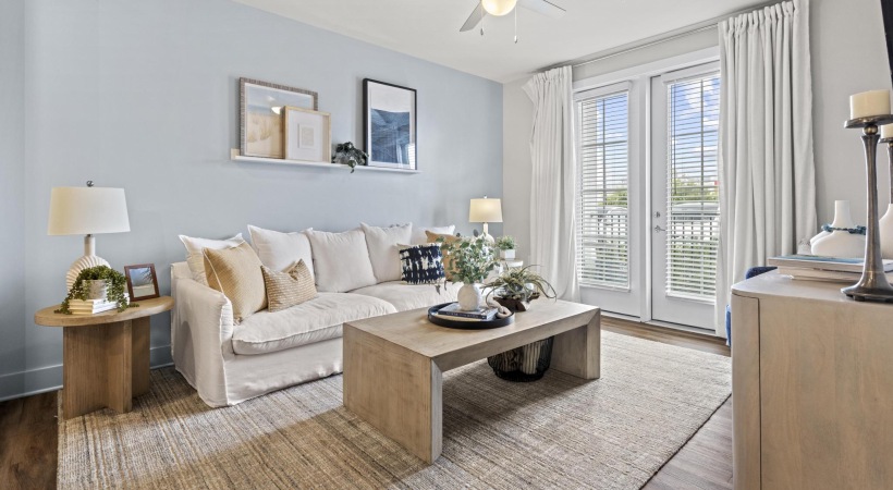 a living room with a couch and coffee table